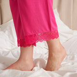 Pretty You London bamboo cami and cropped trouser sleep set pj’s in raspberry pink. Made from the softest thermo-regulating bamboo viscose & lace details.