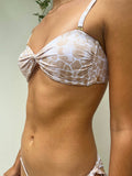 Luxury designer swimwear brand Sophia Alexia Bora Bora bandeau bikini top in sand pebbles. Chic white cream & beige design with twist front & tie back. Detachable straps. For small bust.
Coastal Culture Abersoch 